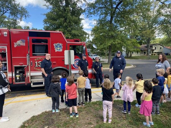 Mifflin fire trucks visiting Gahanna Jefferson elementary school students.